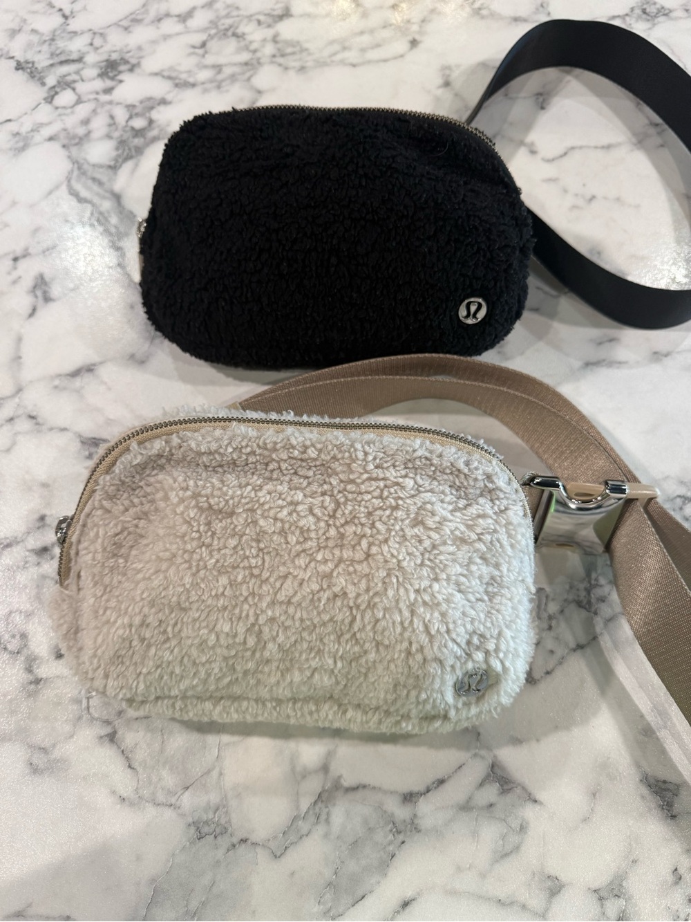 Two Lululemon 1L Sherpa Crossbody Pouch in Black & Cream